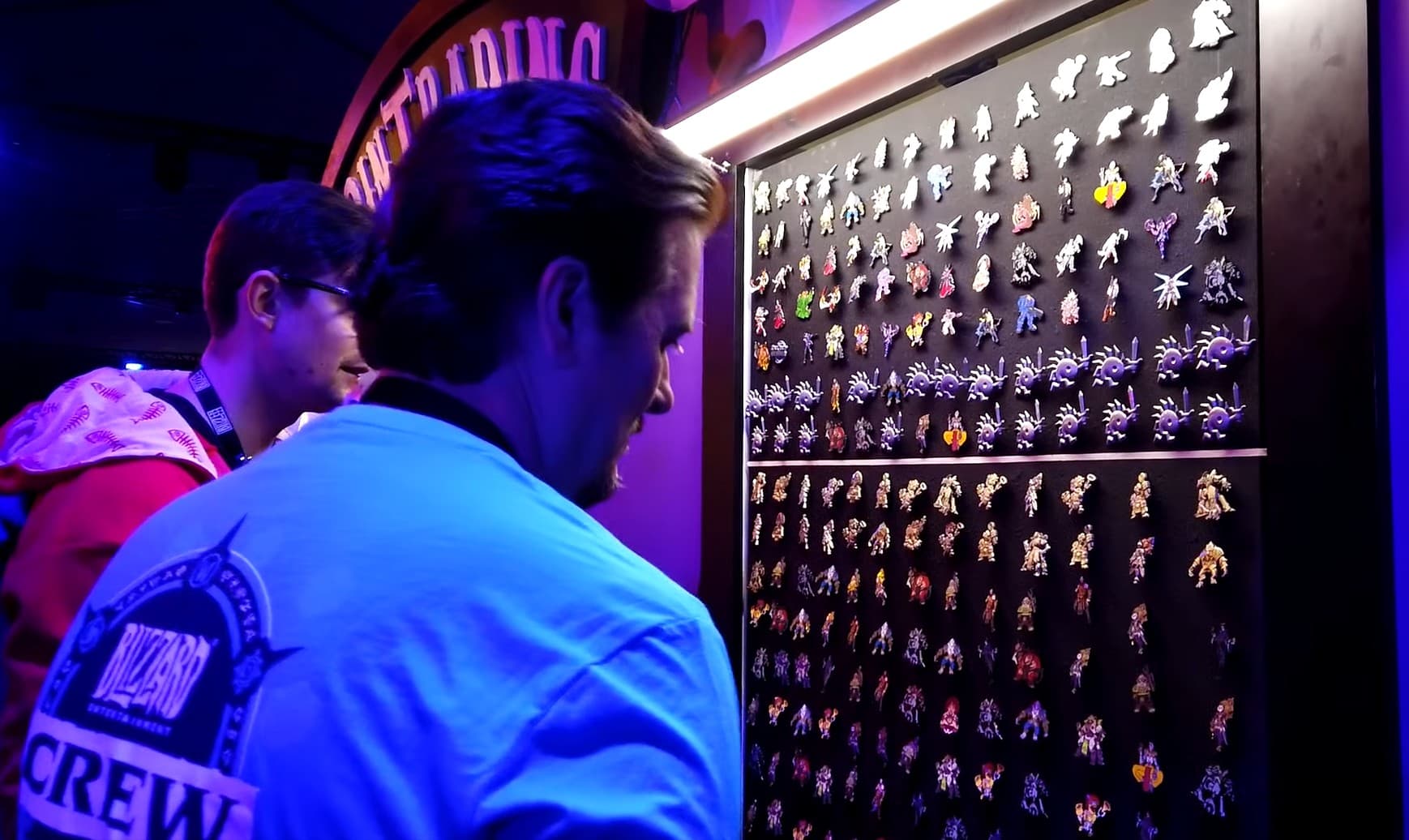 Close-up of an official Blizzard pin trading board filled with collectible pins at BlizzCon